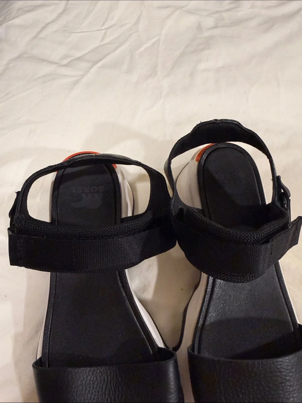 Sorel Black Women’s Sport Sandals with White Sole and Orange Heel Accent